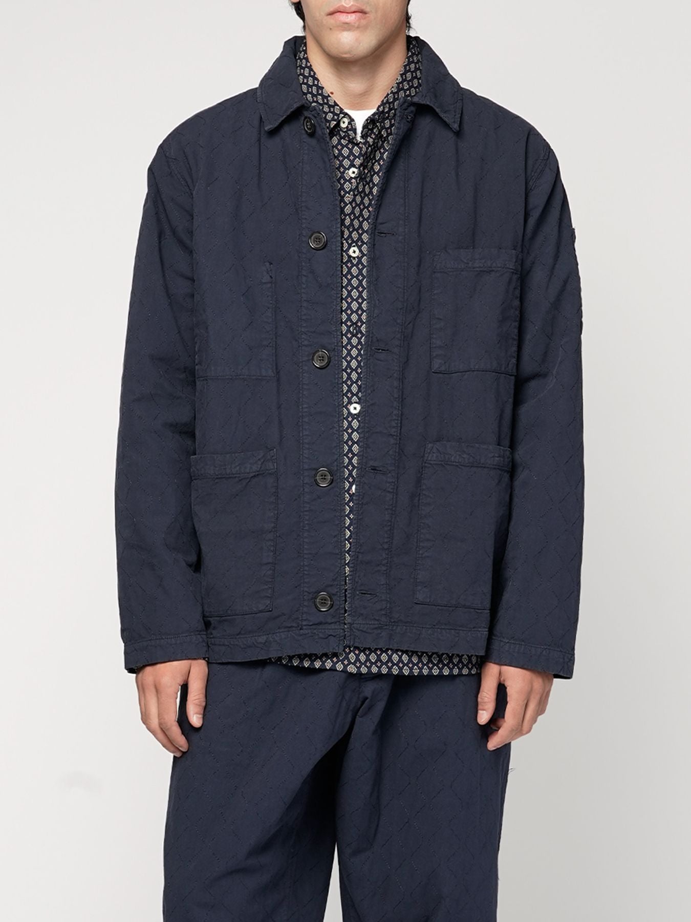 UNIVERSAL WORKS Capispalla quilted coverall jacket